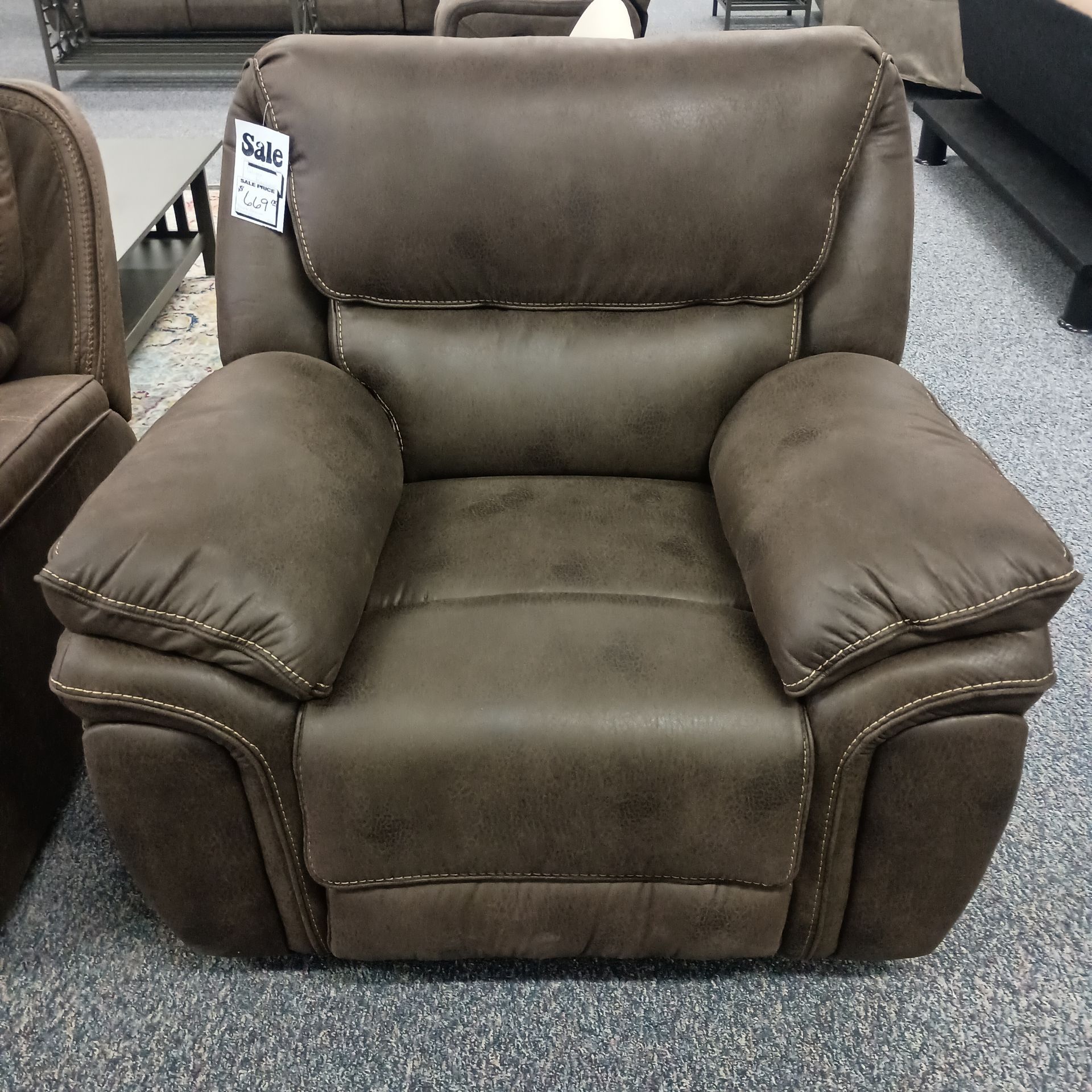 Brown upholstered recliner
