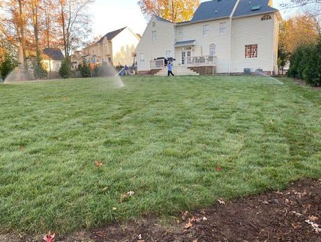 Sprinkler System Watering The Lawn — Henrico, VA — Amigos Landscaping