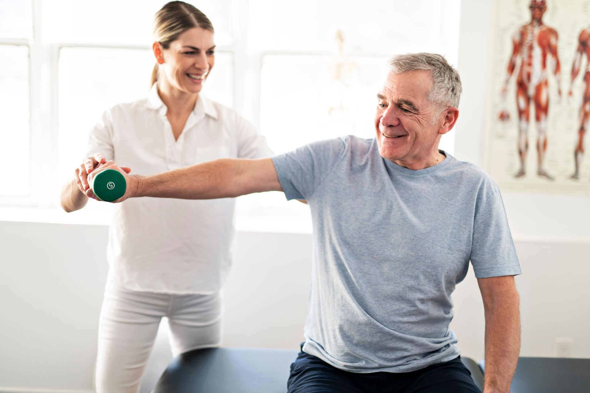 Physical therapy services demonstrating one-on-one rehab session for arm and shoulder recovery. Physical therapy services demonstrating one-on-one rehab session for arm and shoulder recovery.