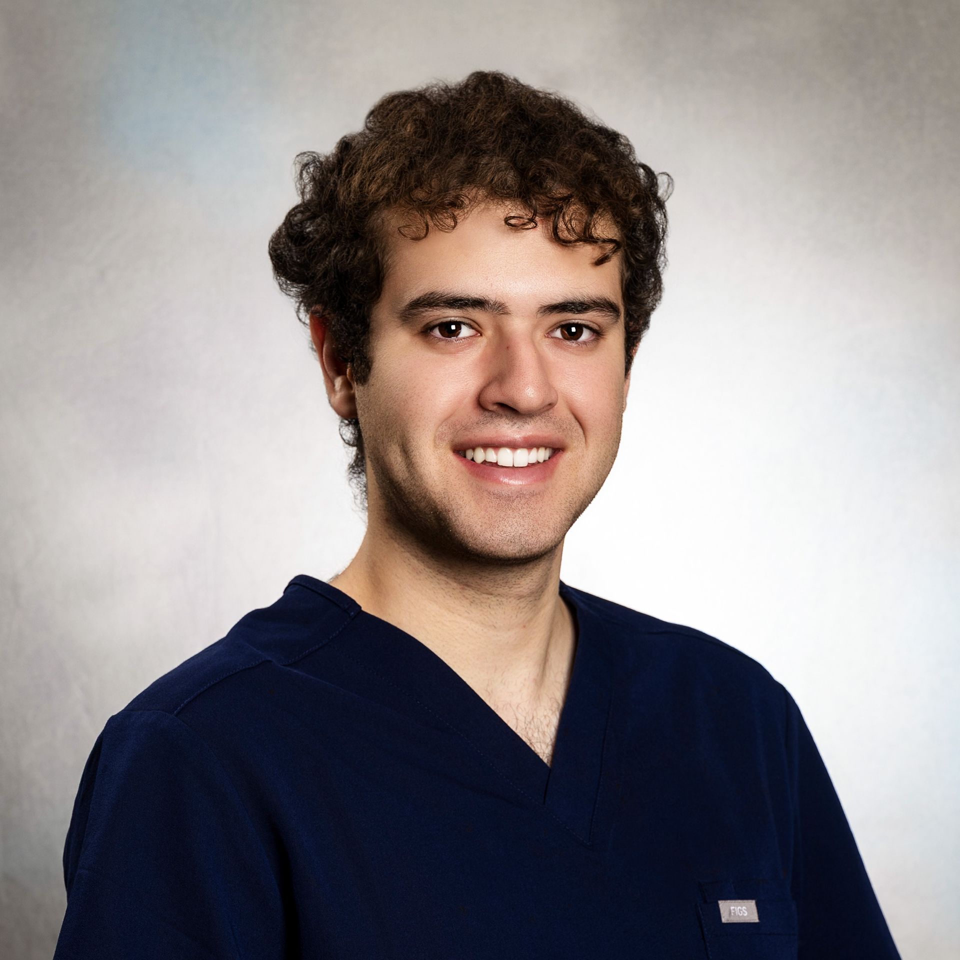 Silhouette of a person from the shoulders up, against a white background.