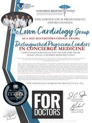 A certificate is presented to distinguished physician leaders in concierge medicine.