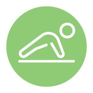 A person is doing push ups on a mat in a green circle.