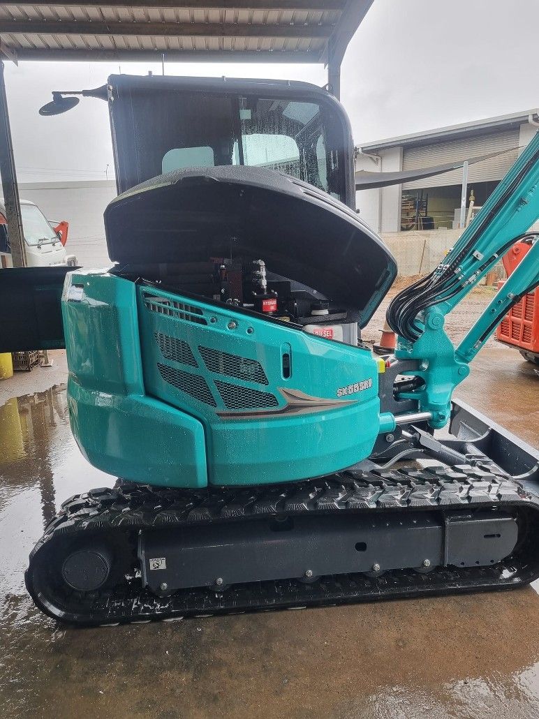 Sany Excavator Is Parked in A Gravel Lot — Giger Machinery Services in Bentley Park, QLD