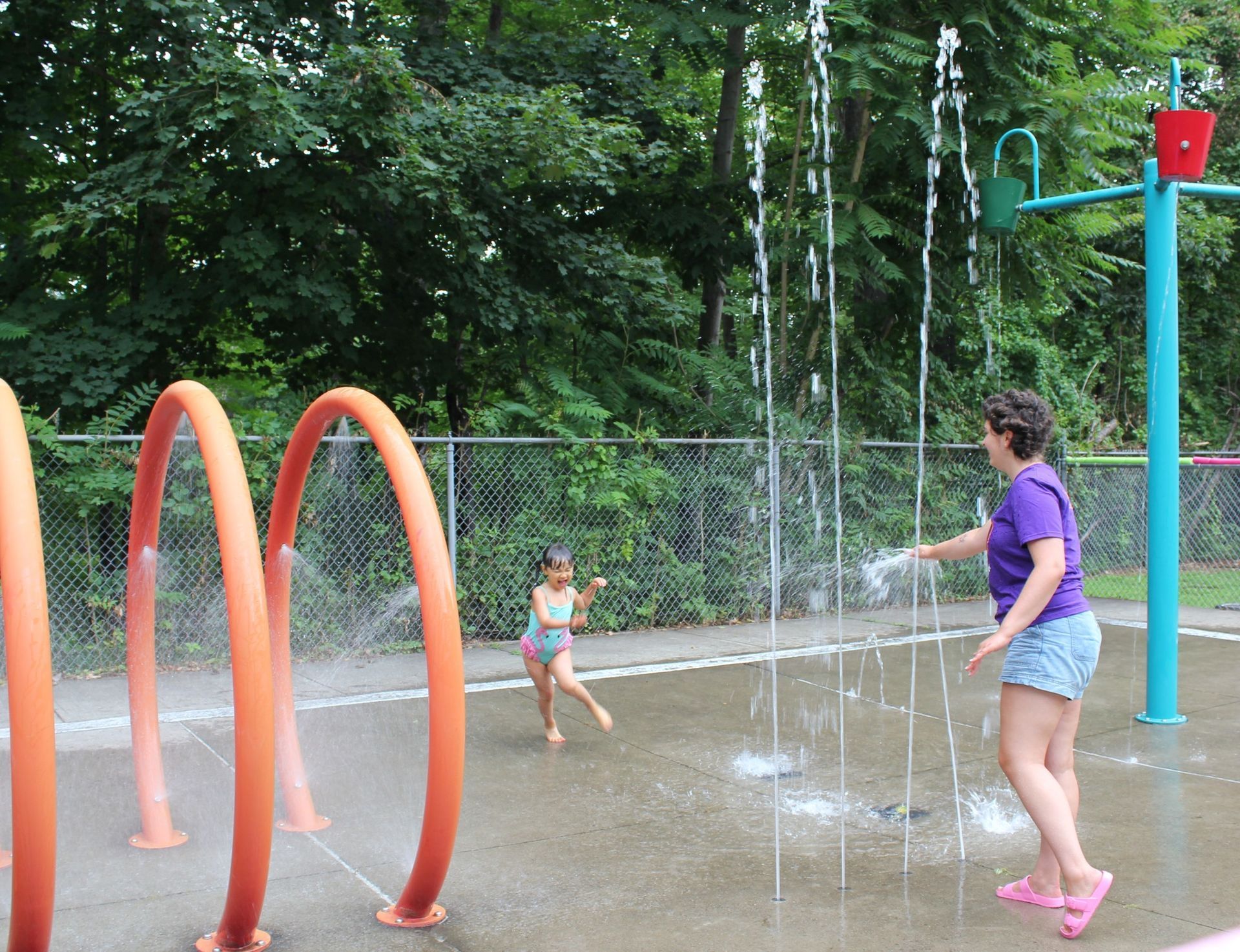 Having fun in the spray park at Kamp for Kids on Welcome Day