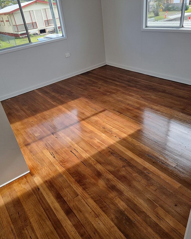 Empty room with walls painted grey — Interior Painting in Fraser Coast, QLD