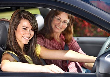 south coast driving school trainee smiling with confidence 