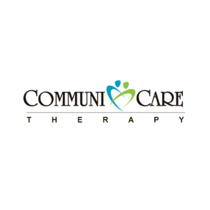 A logo for communi care therapy with a heart in the middle