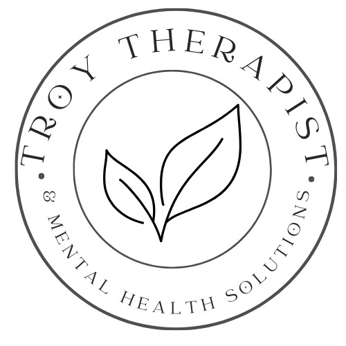 Logo for Troy Therapist & Mental Health Solutions: leaves inside a circle with text.