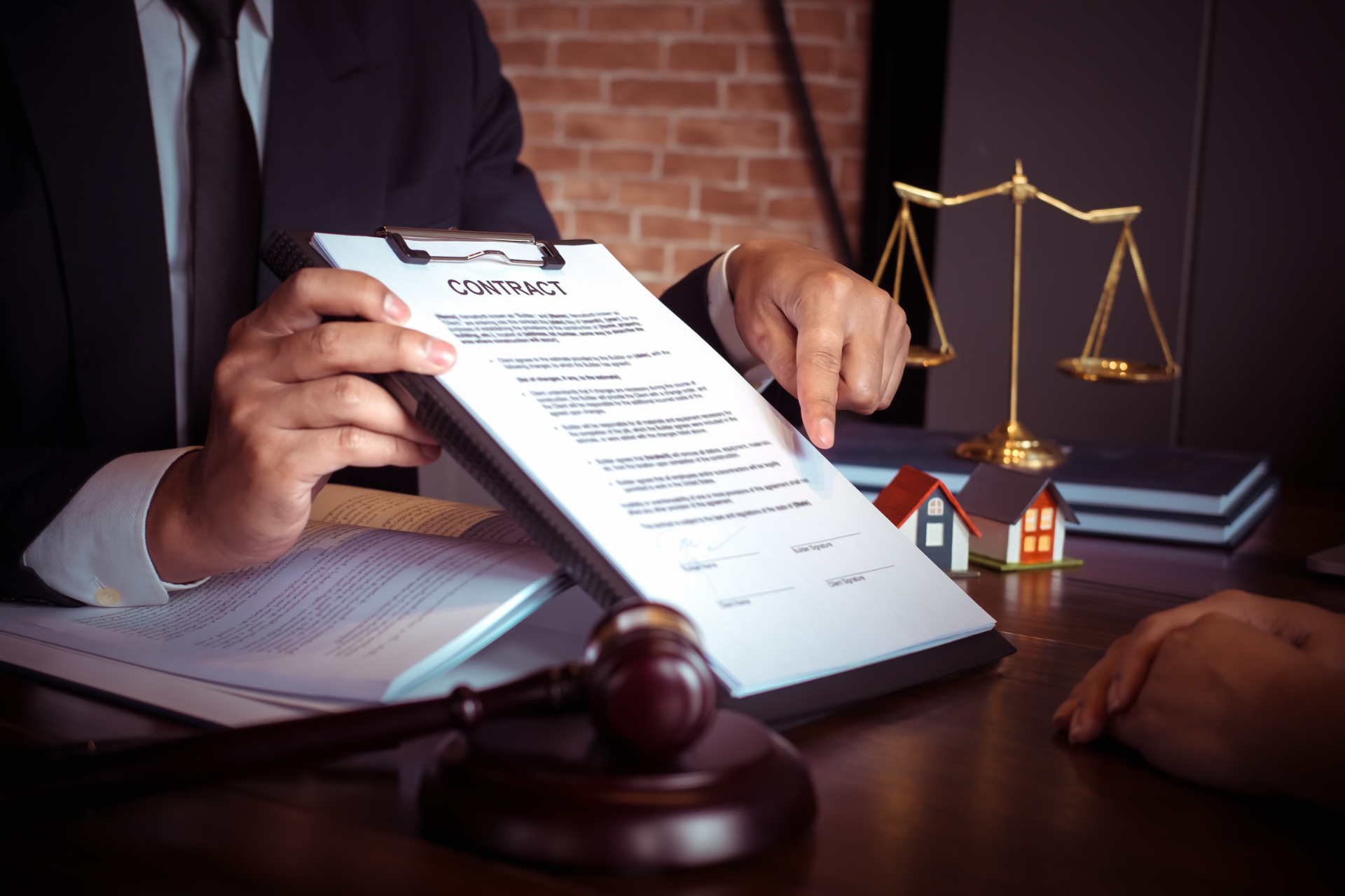 A man in a striped shirt is smiling for the camera.