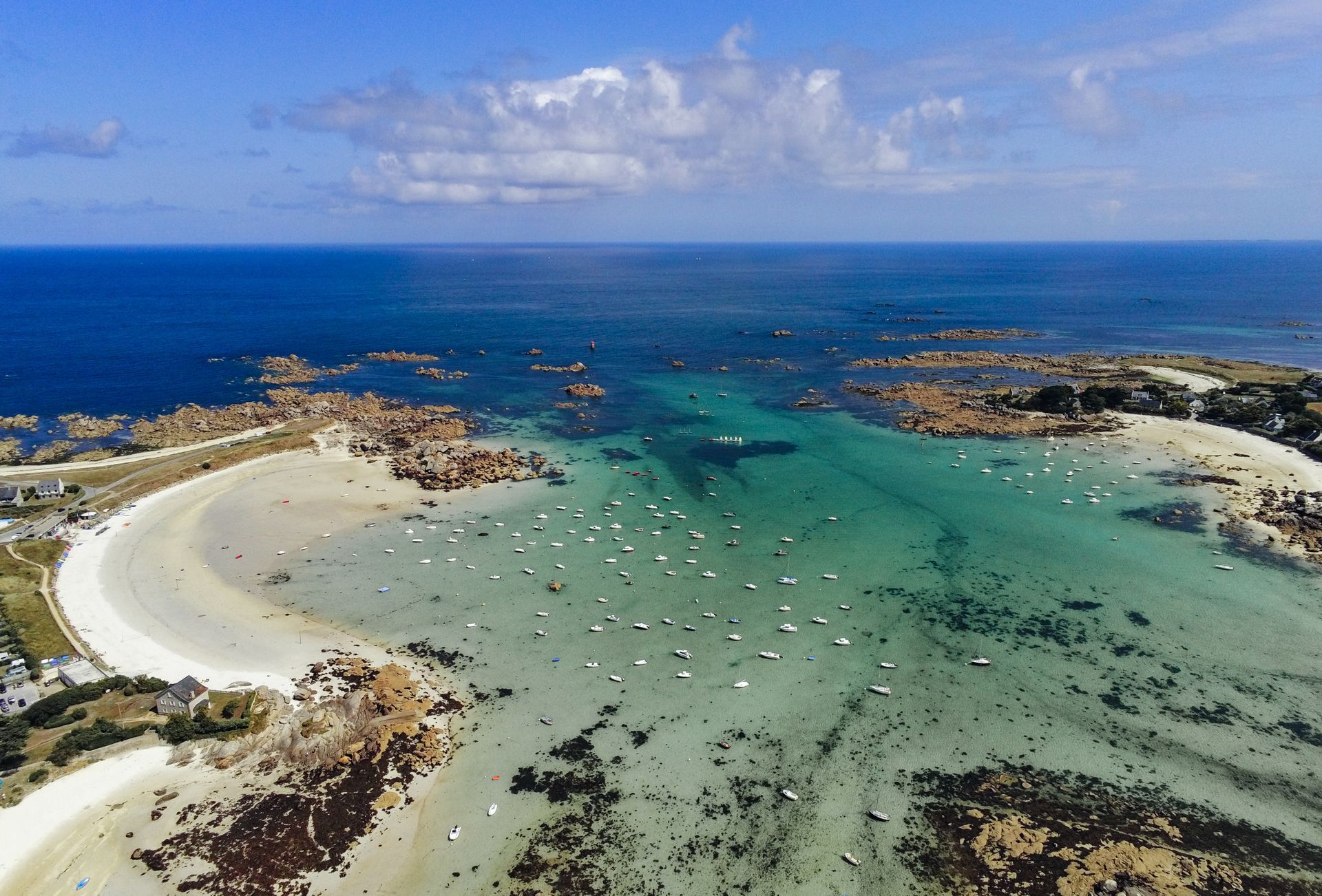 Aerial view of a sandy beach, clear turquoise 