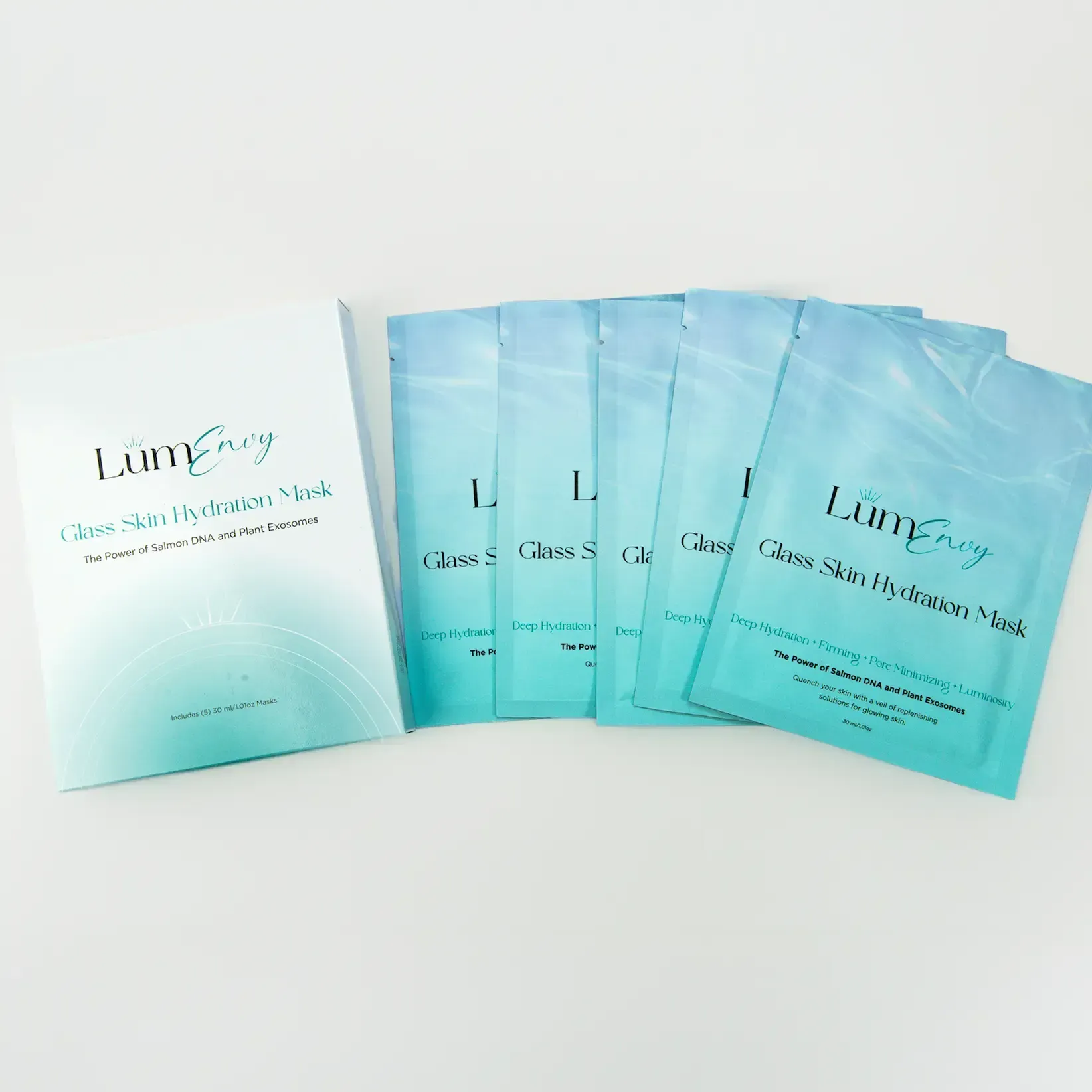 A box and five matching teal-colored pouches of LumEnvy Glass Skin Hydration Mask arranged on a white background.