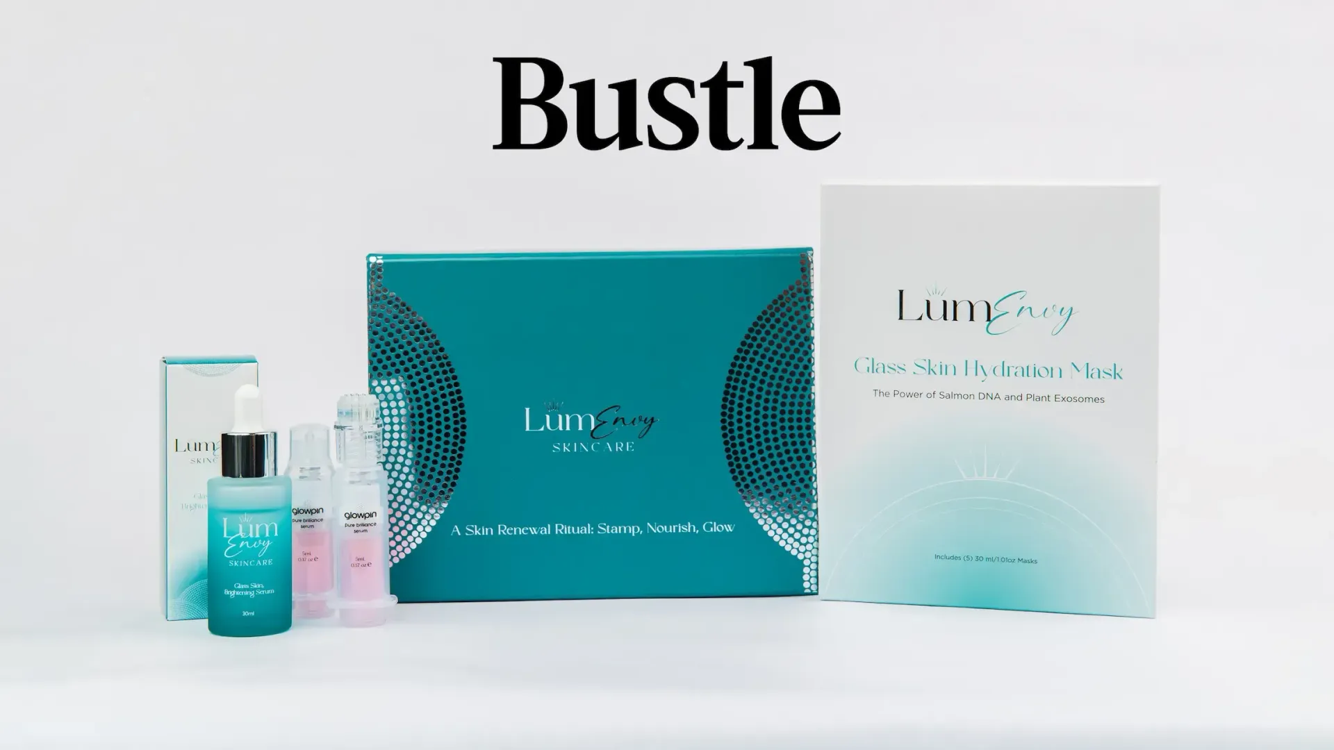 A teal-themed skin care set featuring a bottle, two small vials, a box, and a face mask packet against a white background.