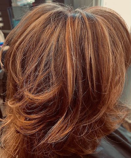 A close up of a woman 's hair in a salon.