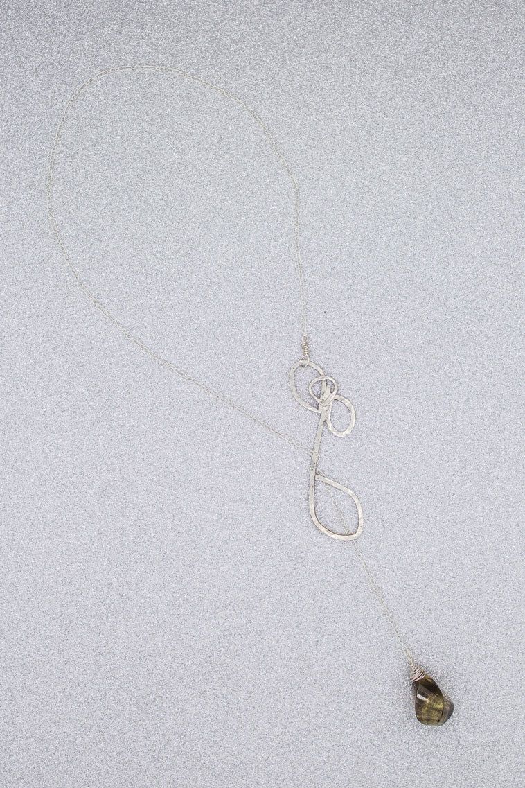 A close up of a white surface with a hole in it.