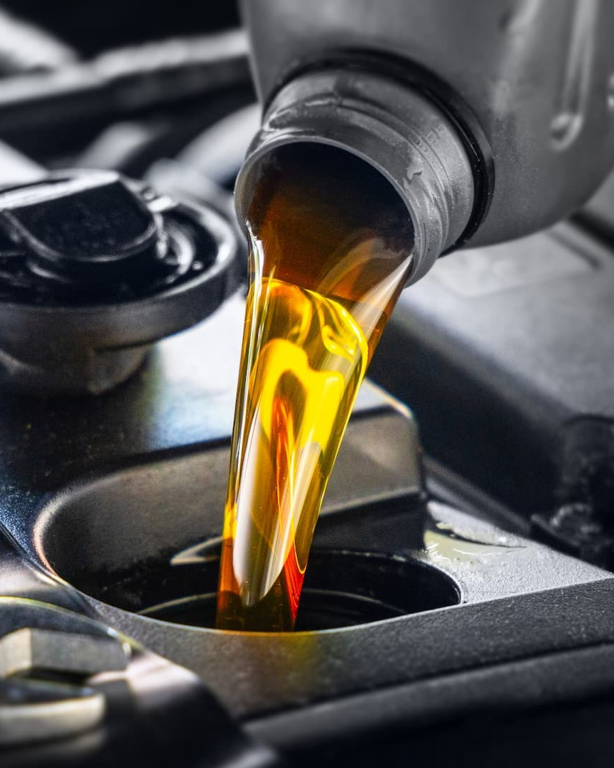 Oil being poured | Auto Repair at The Hive
