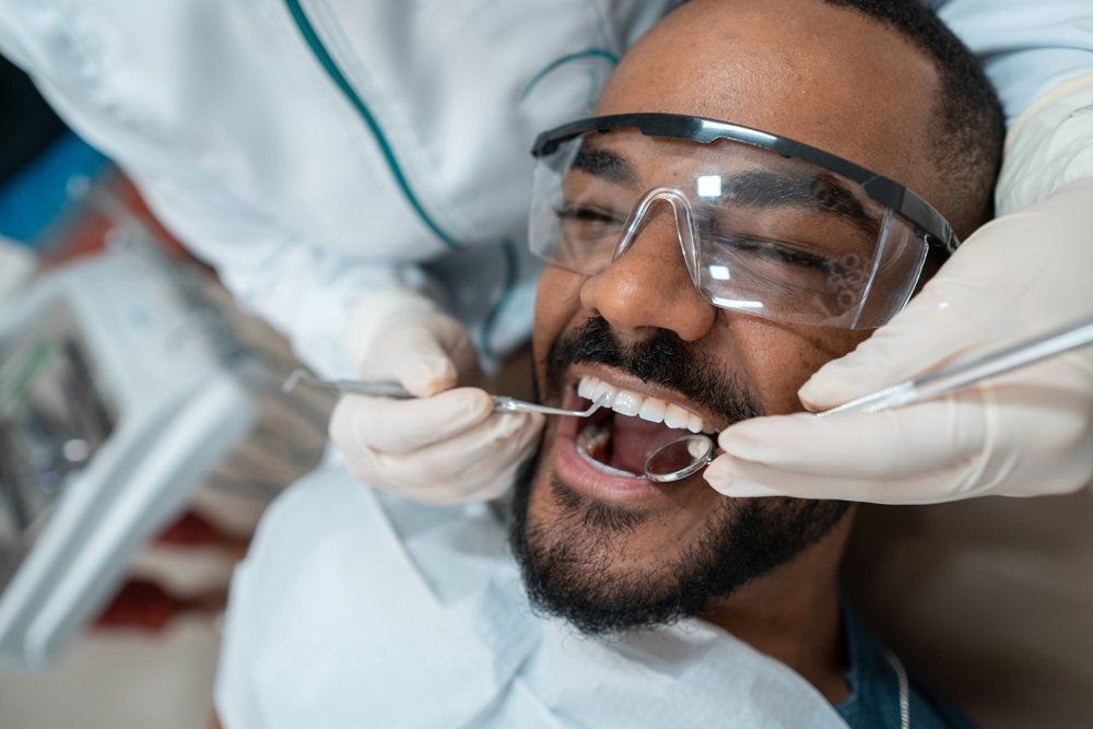 Man During A Dental Checkup — Palestine, TX — Forrest Westmoreland, DDS
