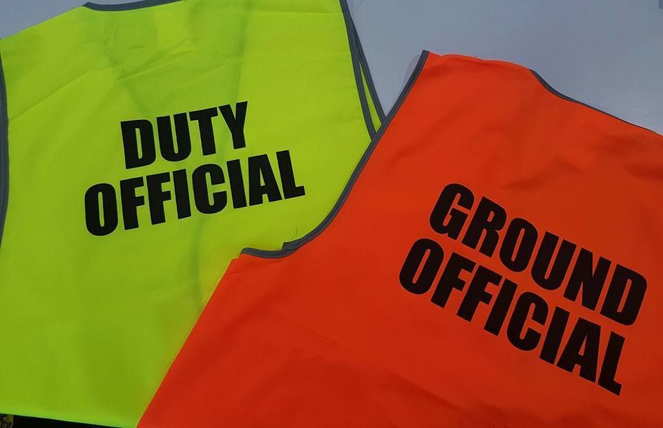 A Yellow Vest Says Duty Official And An Orange Vest Says Ground Official — Sportstar Screenprinting In Newtown, QLD