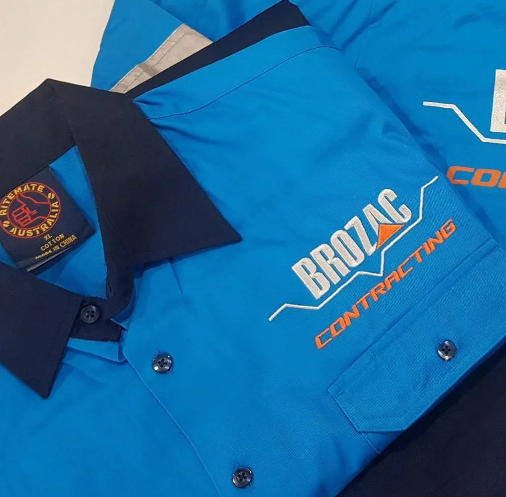 A Blue Shirt That Says Brozac Contracting On It — Sportstar Screenprinting In Newtown, QLD