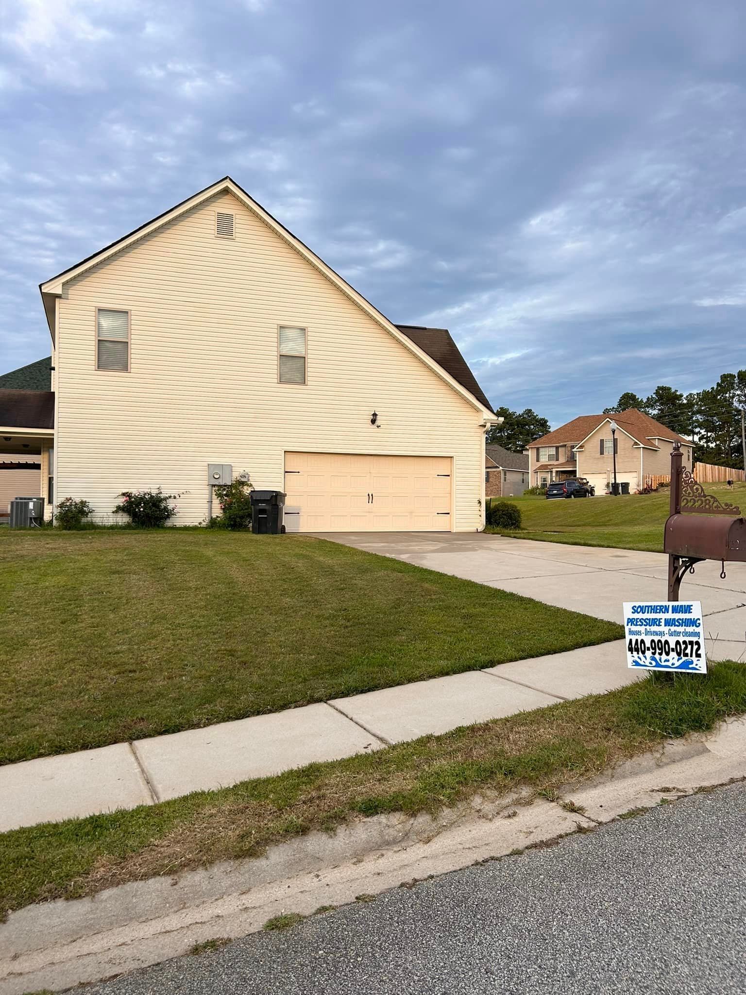 A house with a sign in front of it that says ' i voted '