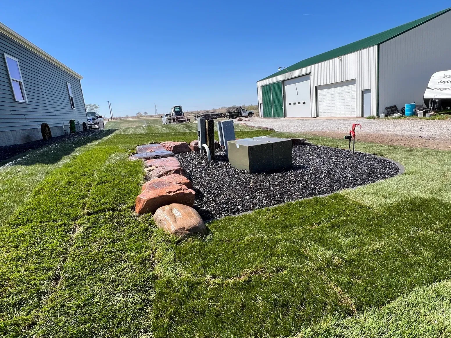 A Lawn with Rocks and Gravel — Exeter, NE — Axline Landscaping & Trees