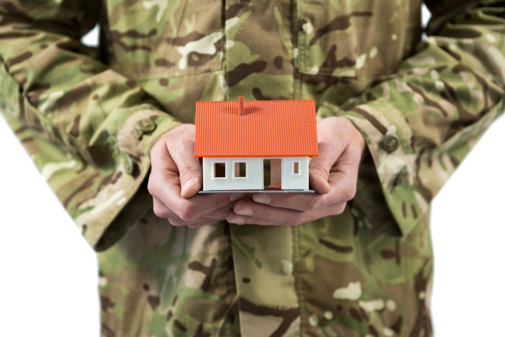 Defence holding a small home model