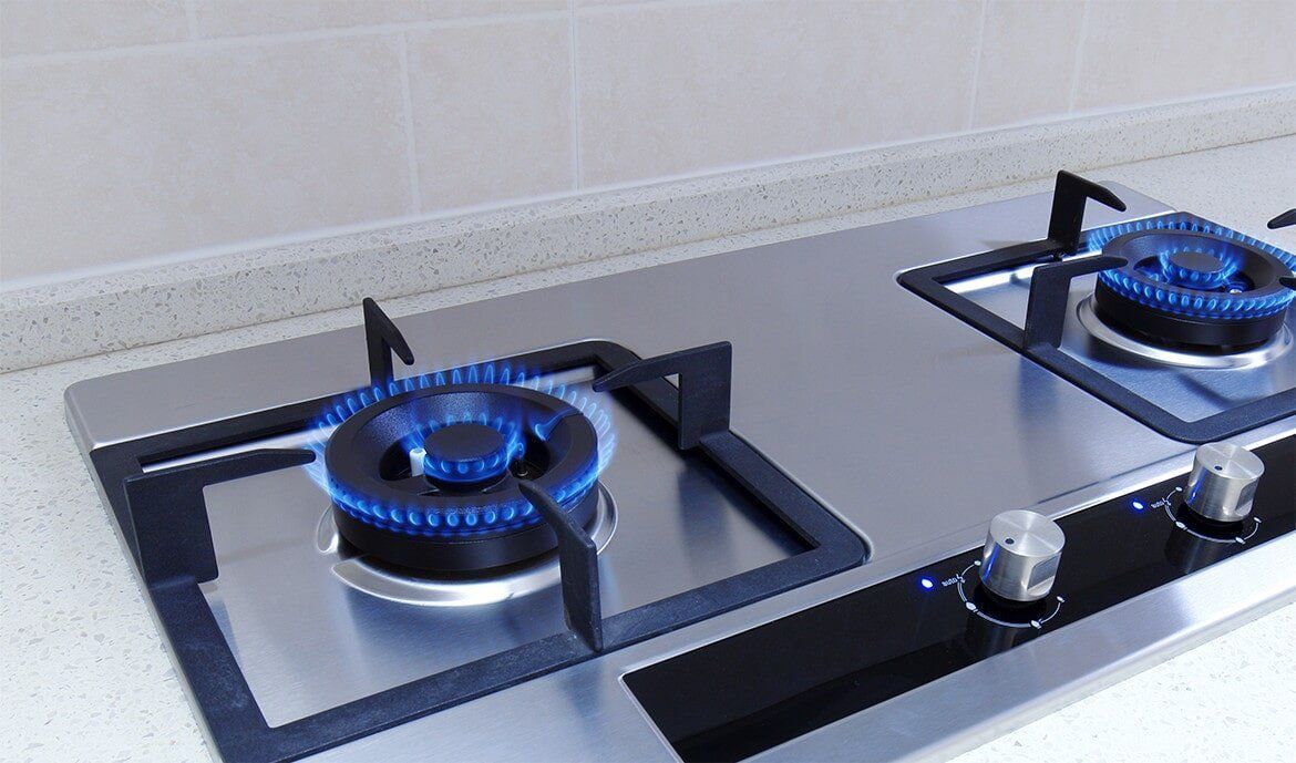 A Gas Stove With Two Burners is Sitting on a Counter — Fastcall Group In Herbert, NT