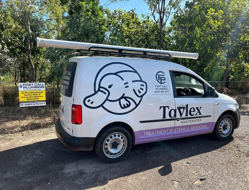 A White Taylex Van is Parked on the Side of the Road — Fastcall Group In Herbert, NT
