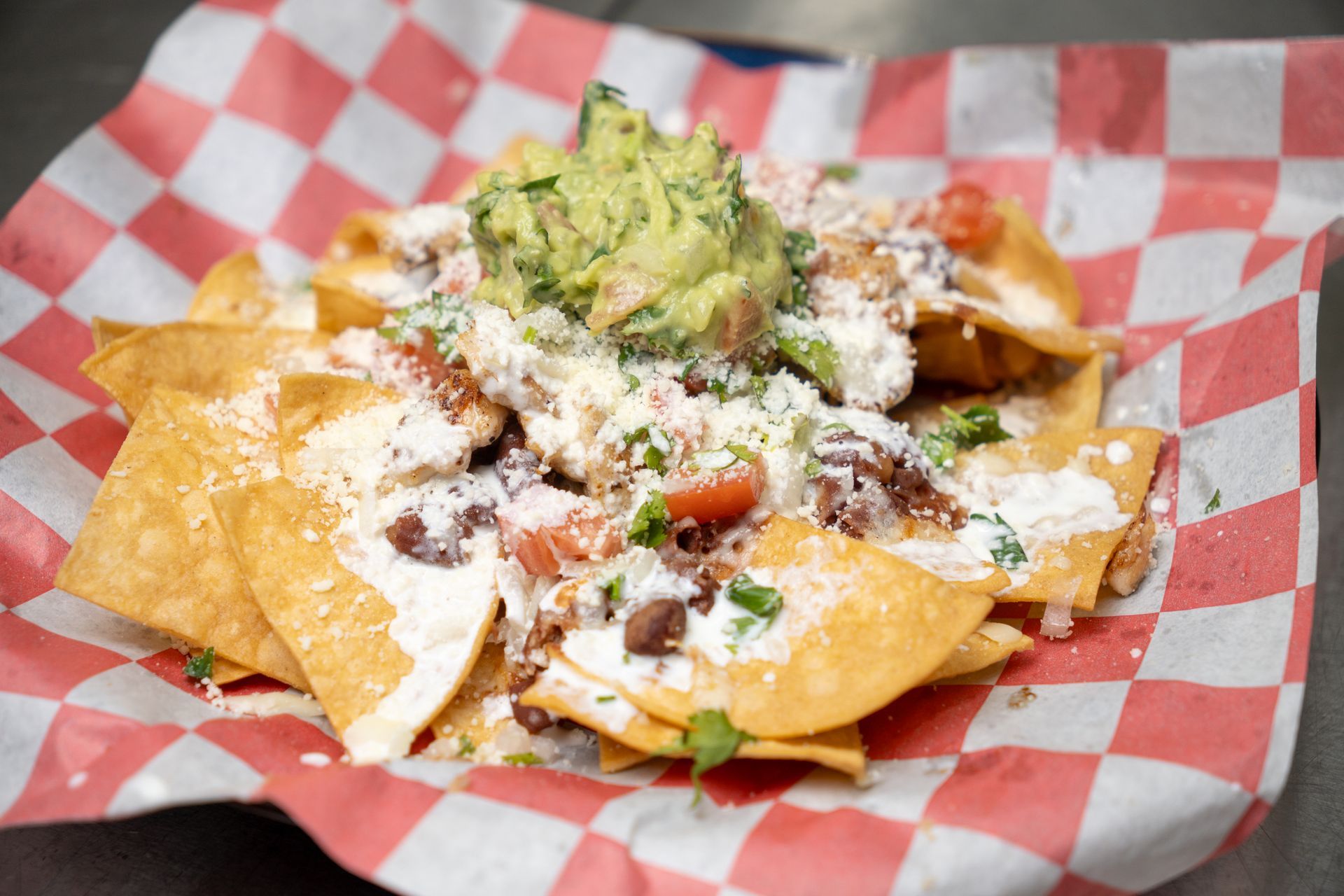 A blue plate topped with fried chicken and french fries