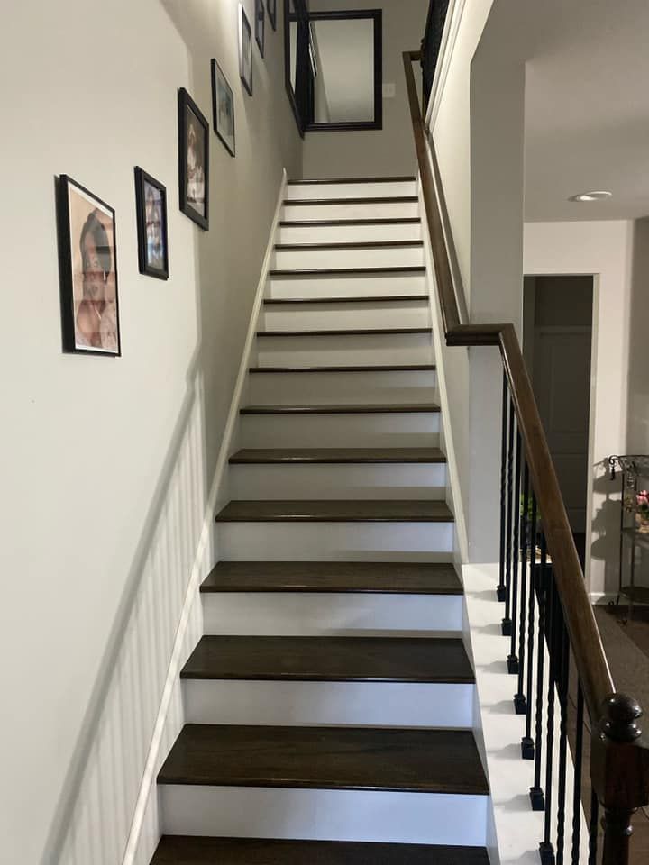 A set of stairs leading up to the second floor of a house.
