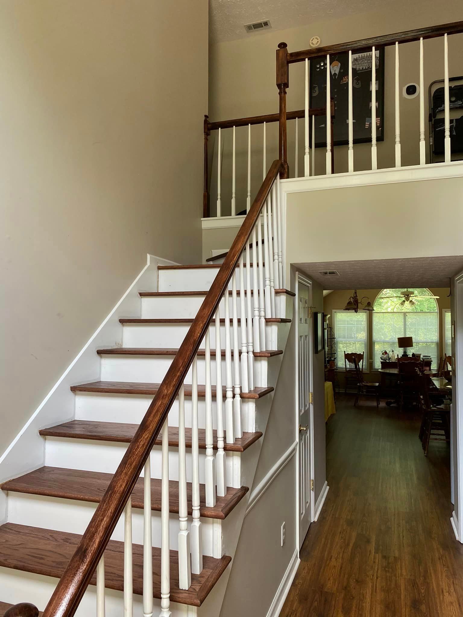 A staircase leading up to the second floor of a house