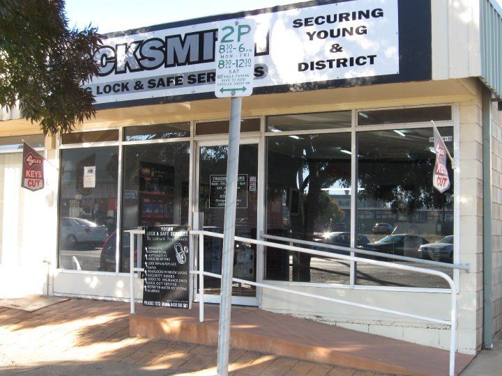 A store front with a sign that says securing young & district