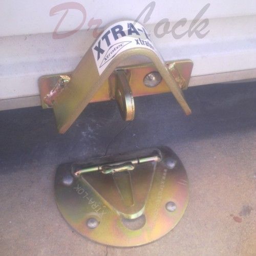 A close up of a xtra lock on a door