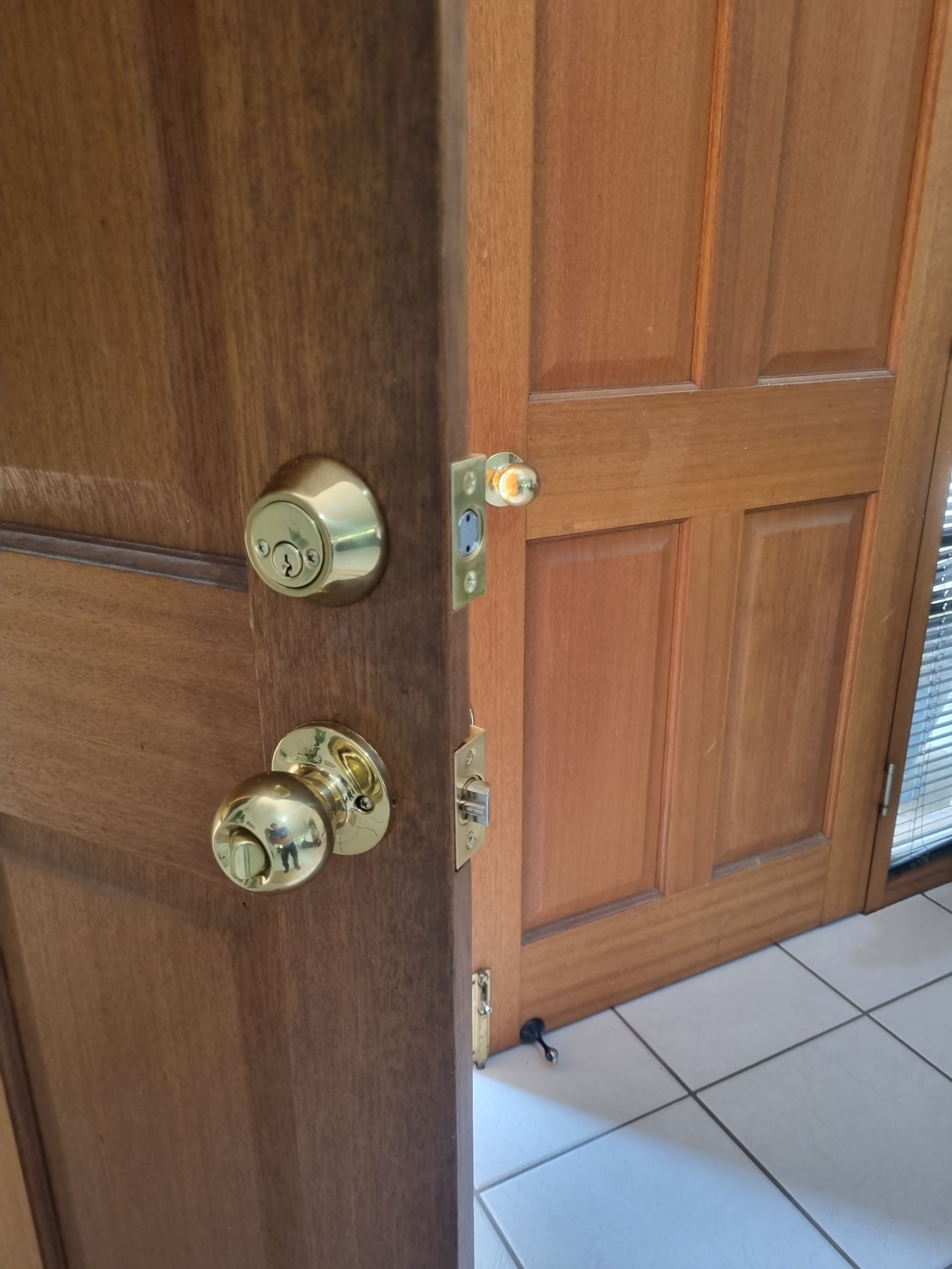 Front Door Open — Locksmith in Annandale, QLD