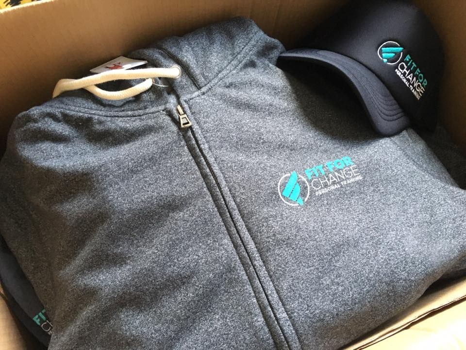 Close Up View Of Custom Made Jacket And Cap — Promotional Apparel In Wollongong, NSW