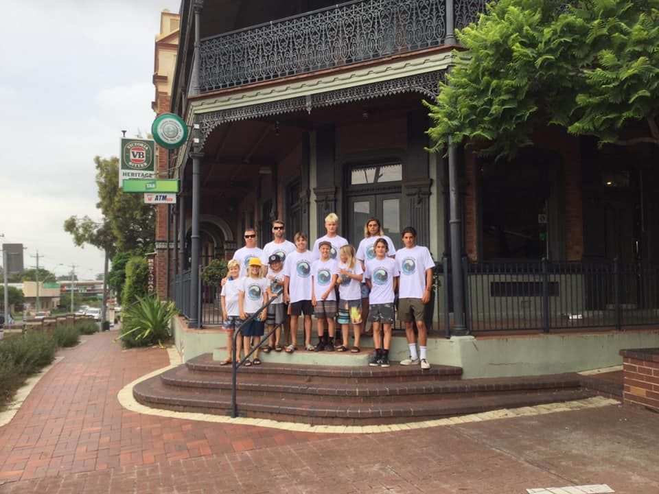 Group Of People Wearing White Printed Shirts — Promotional Apparel In Kiama, NSW