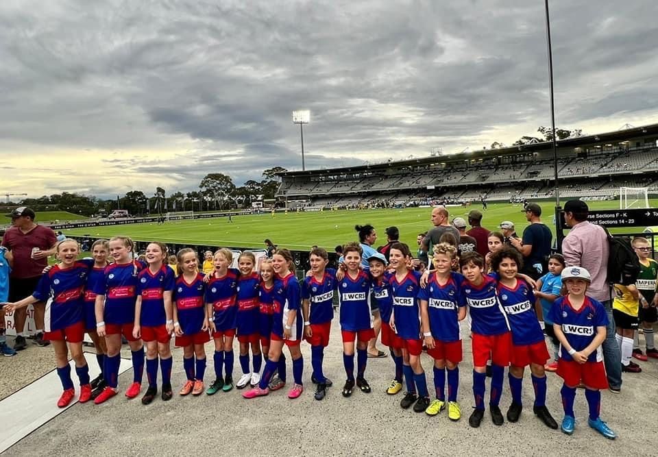 Football Players Inside The Football Stadium Wearing Printed Jersey — Promotional Apparel In Shellharbour, NSW