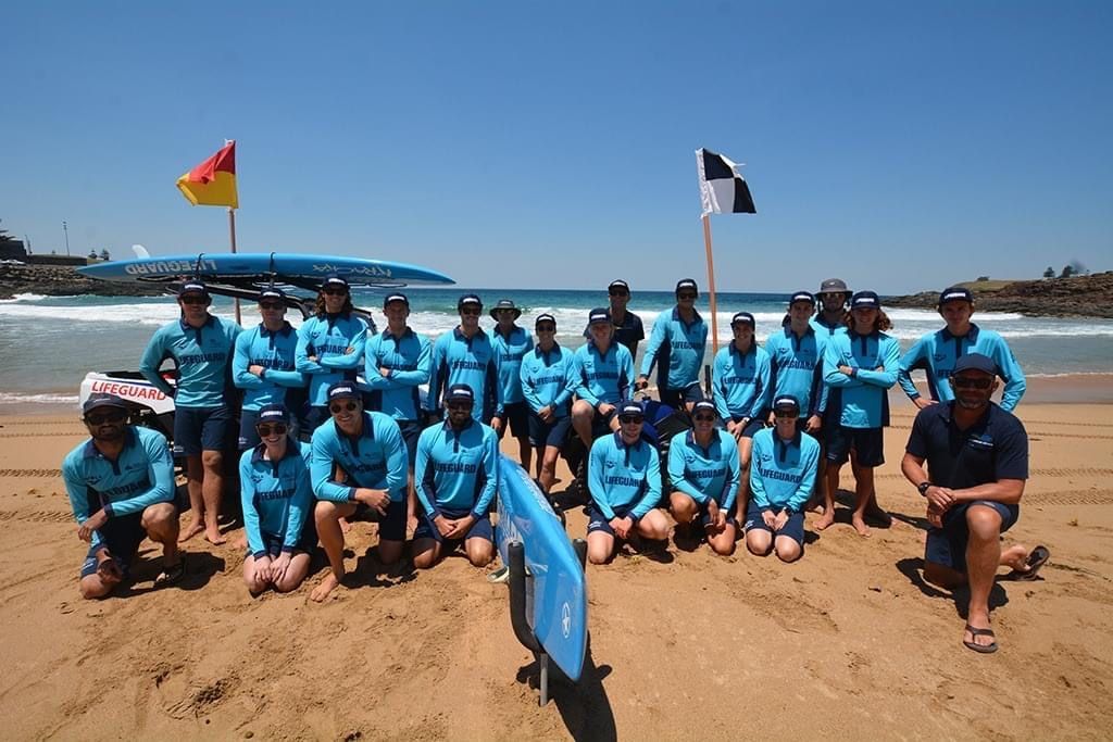 Group Of People Wearing Longsleeve And Cap At The Beach — Promotional Apparel In Woonona, NSW
