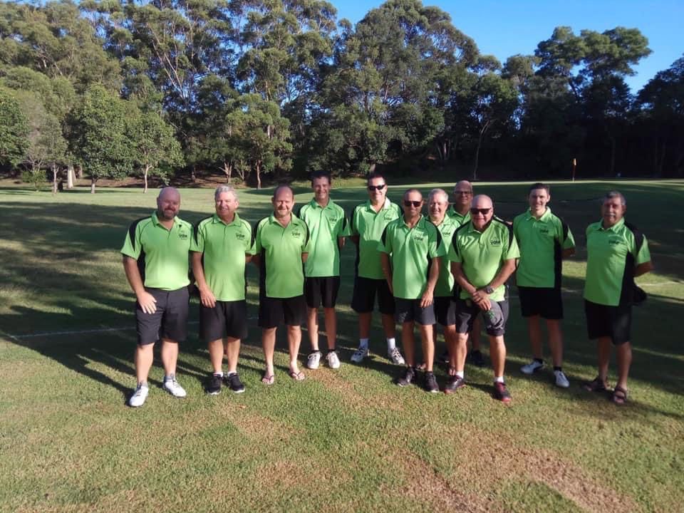 Group Of Men Wearing Green Polo Shirts At The Open Field — Promotional Apparel In Shellharbour, NSW