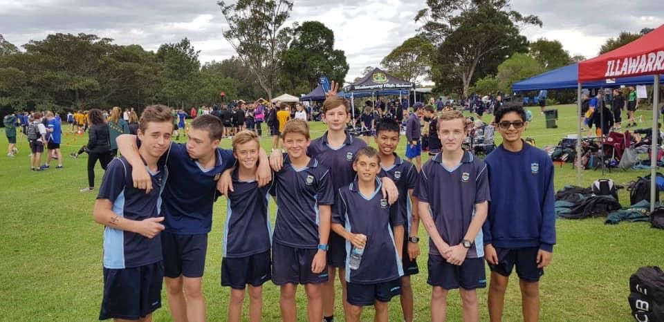Group Of People Wearing Navy Blue Uniform At The Field — Promotional Apparel In Woonona, NSW