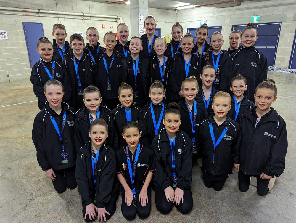 Kids Wearing Black Jacket With Their Ids — Promotional Apparel In Woonona, NSW