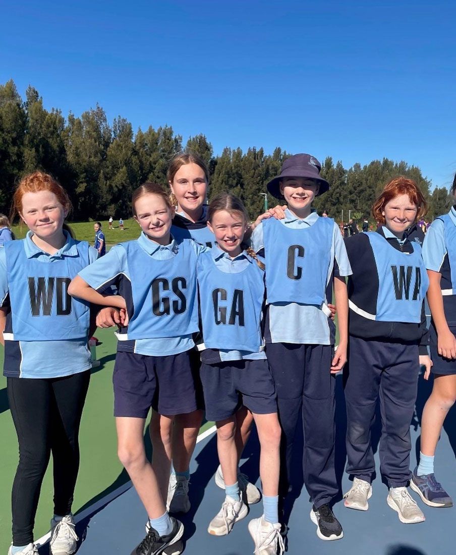 Youngsters Sporting Custom Lettered Vests — Promotional Apparel In Woonona, NSW