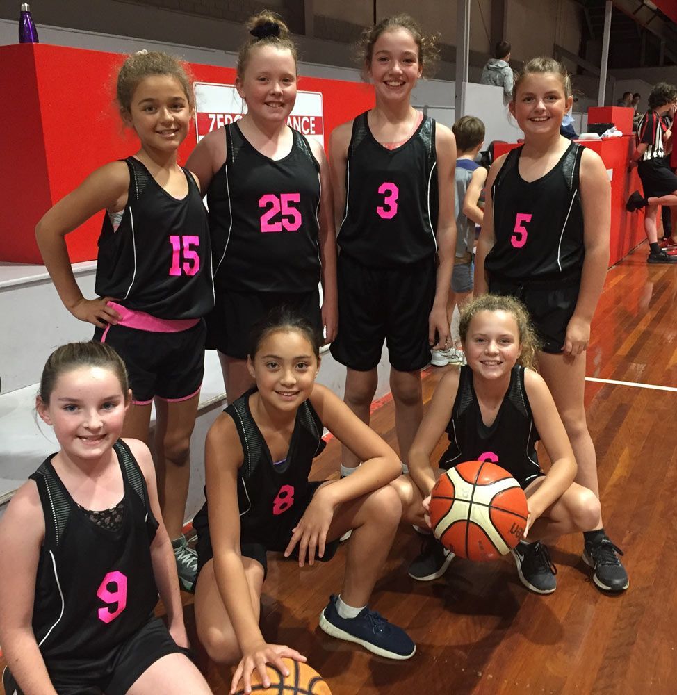 Kids Wearing Their Jersey At The Court — Promotional Apparel In Kiama, NSW