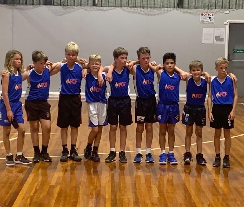 Kids Wearing Basketball Uniform — Promotional Apparel In Woonona, NSW