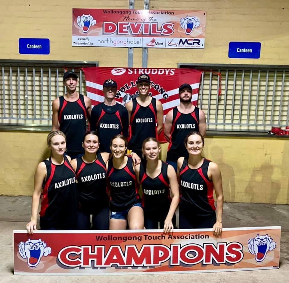 Champion Photo Of Axolotls Team Wearing Promotional Wear — Promotional Apparel In Wollongong, NSW