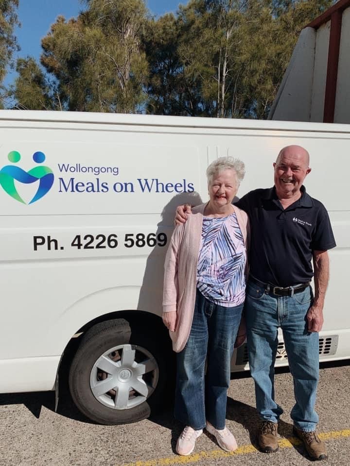 Men And Women With White Van Background — Promotional Apparel In Shellharbour, NSW