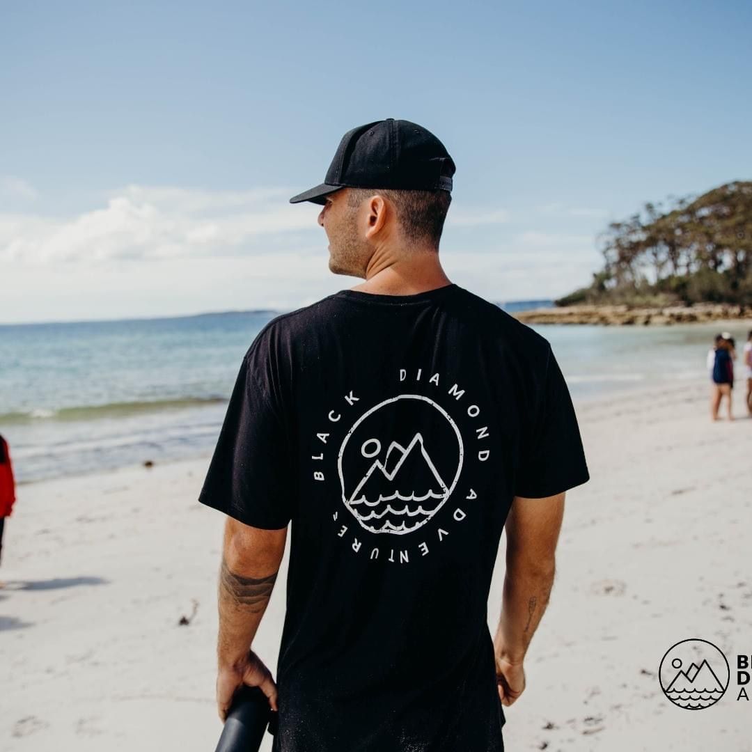 Man Wearing Black Promotional T-Shirt With Black Cap — Promotional Apparel In Woonona, NSW