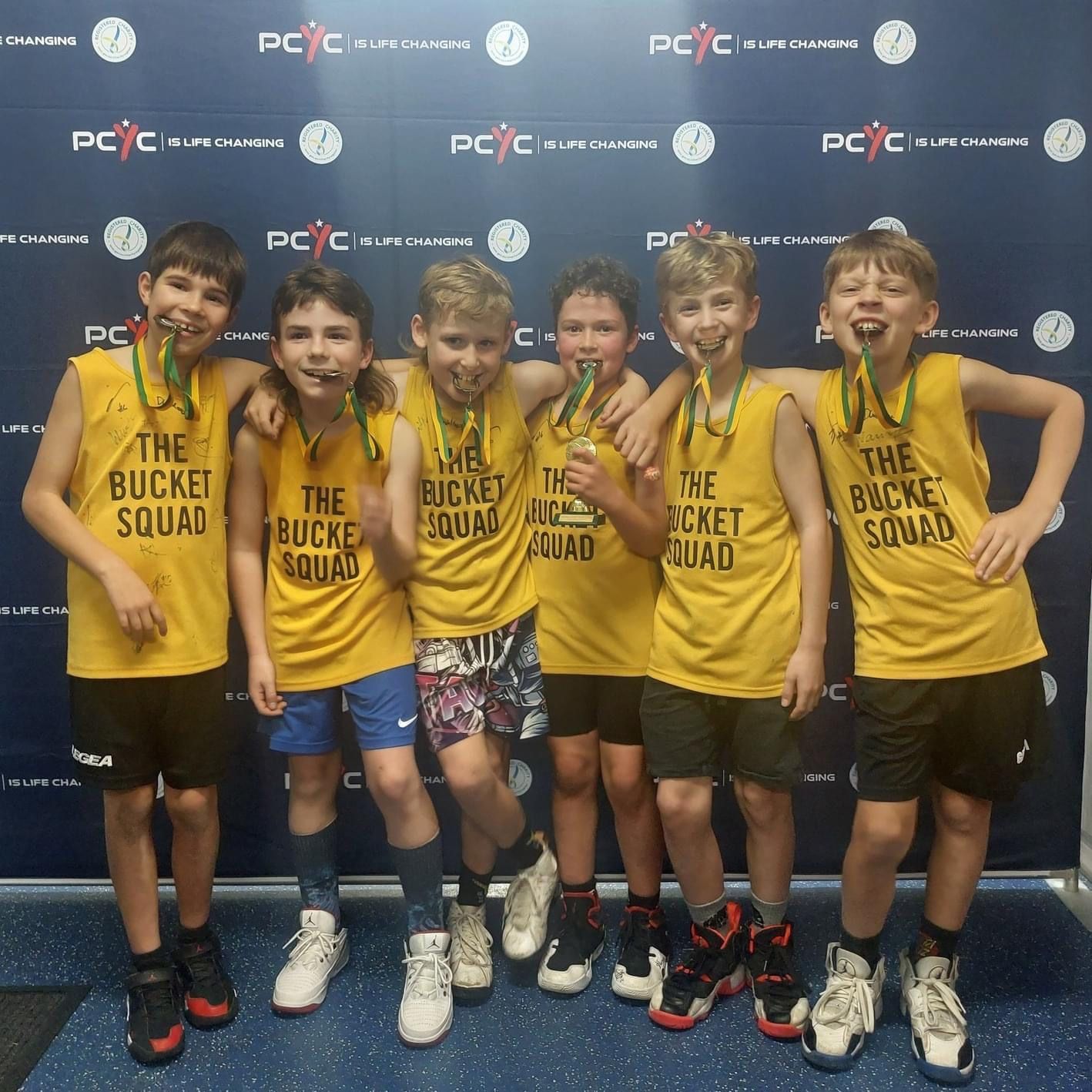 A Group Of Children In Yellow Vests — Promotional Apparel In Woonona, NSW