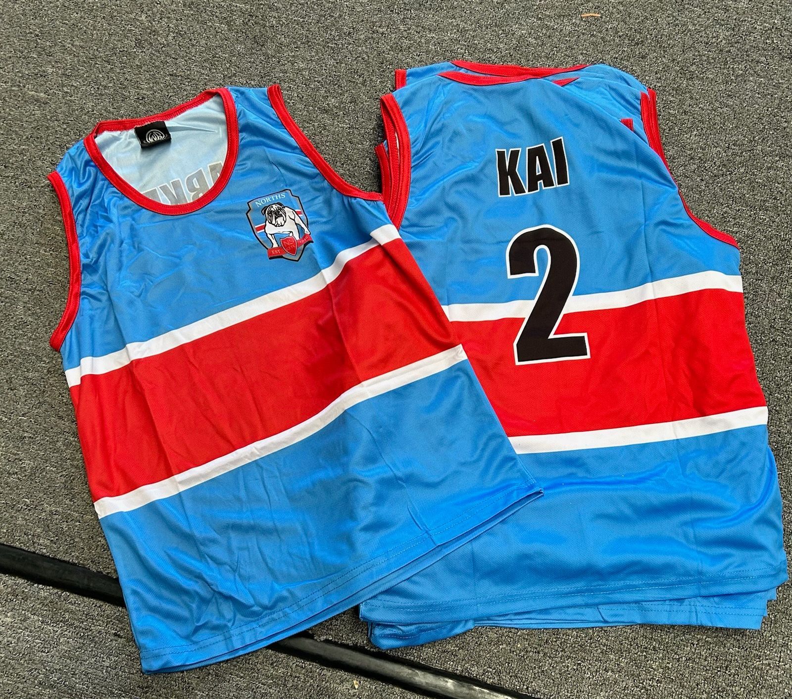 Two Red And Blue Vests — Promotional Apparel In Woonona, NSW
