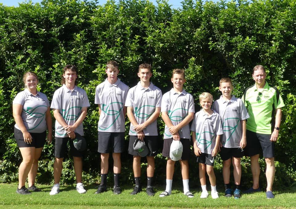 Teammates With Their Coach At The Field — Promotional Apparel In Woonona, NSW