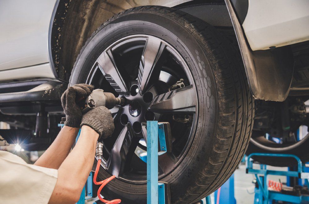 Changing the Tire — Waterloo, IA — K and S Wheel Alignment